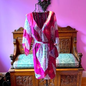 100% silk dress - lined and only worn once. Elastic waist with tie.